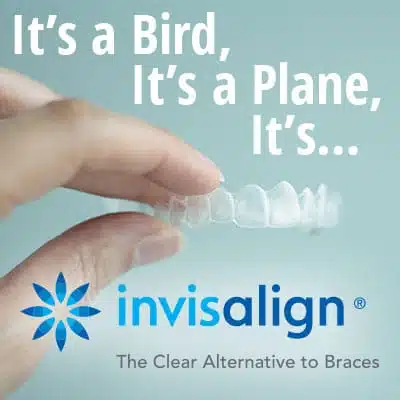 It’s a Bird, It’s a Plane, It’s…Invisalign®! 1 A person holding a clear aligner in their hand.