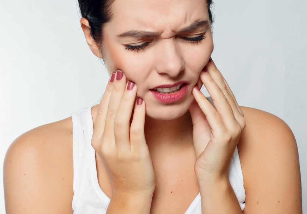 Teeth Problem. Woman Feeling Tooth Pain