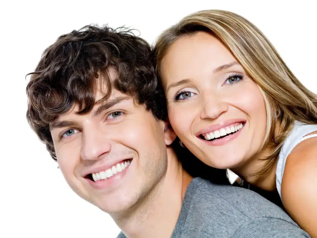 Happy Couple smiling after professional teeth whitening.