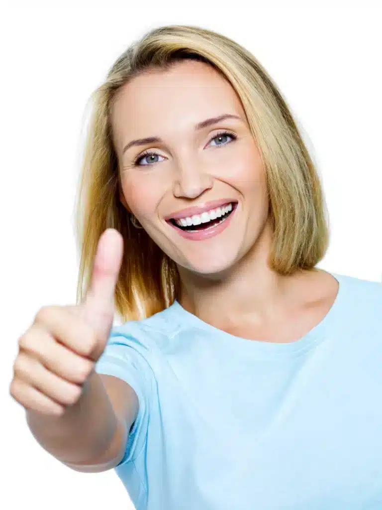 Blonde woman in a blue T-shirt smiling after a professional teeth whitening.
