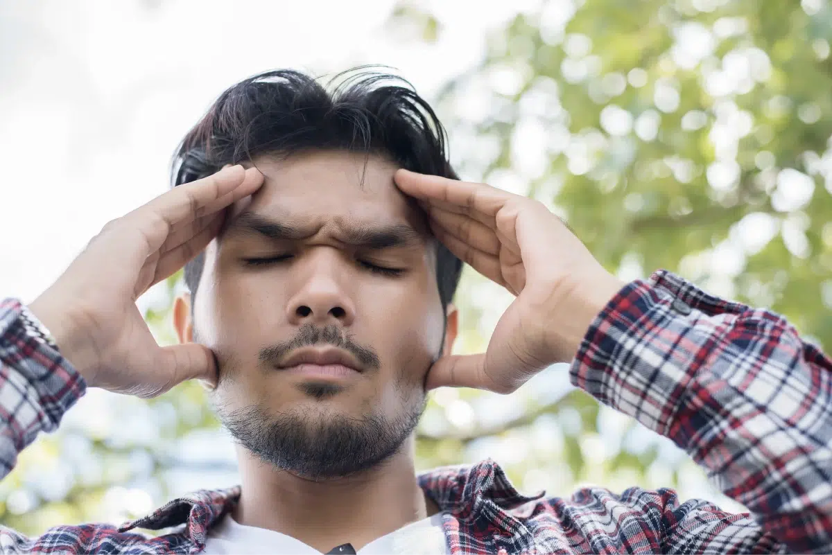 Man struggling with pain in his facial area