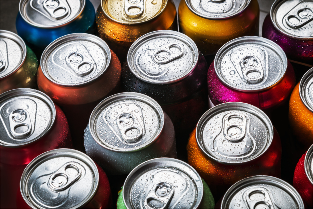 Assorted colorful soda cans.